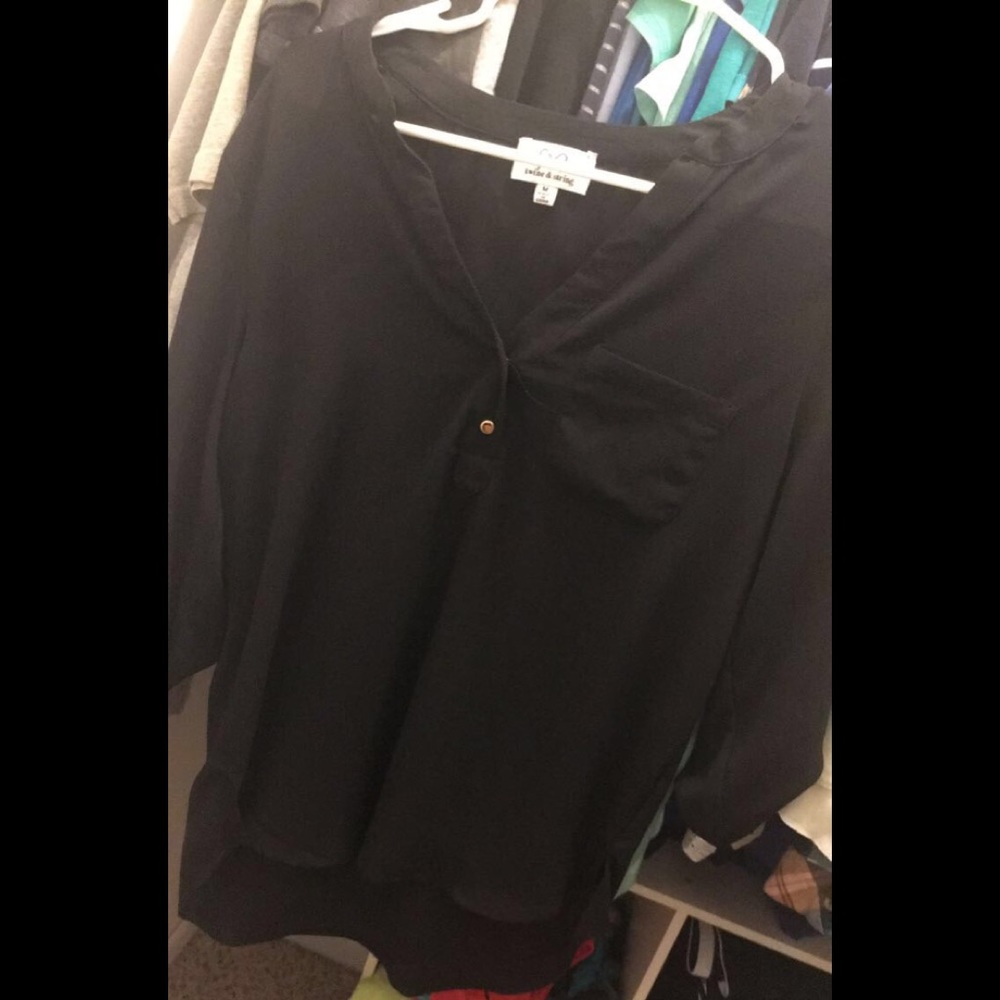 Medium. Black. Cuffed wrists